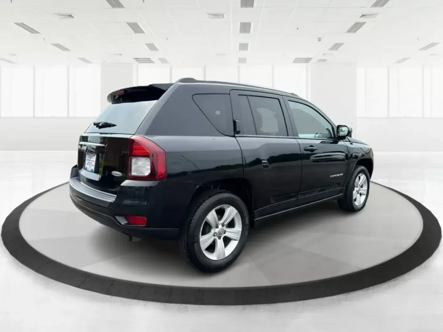 2014 Jeep Compass Latitude (1C4NJCEB4ED) with an Other engine, located at 1099 N County Rd 25A , Troy, OH, 45373, (937) 908-9800, 40.057041, -84.215462 - Photo#2