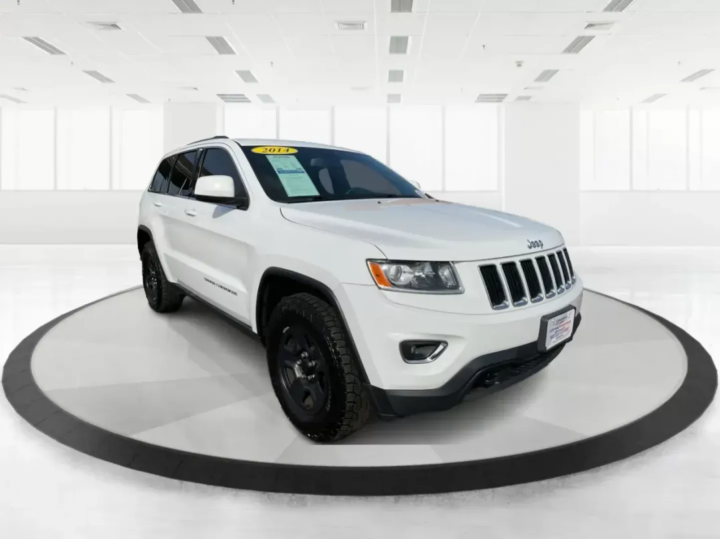 2014 Jeep Grand Cherokee Laredo (1C4RJFAGXEC) with an 3.6L V-6 DOHC engine, located at 4508 South Dixie Dr, Moraine, OH, 45439, (937) 908-9800, 39.807072, -84.031563 - Photo#0