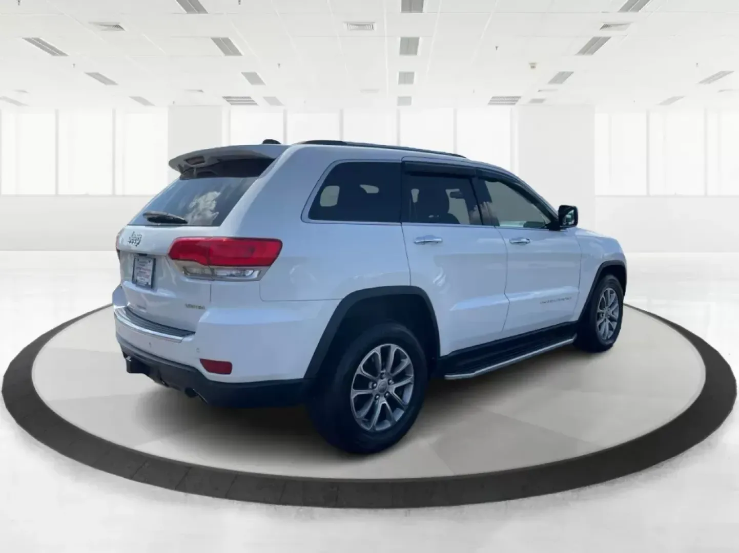 2014 Jeep Grand Cherokee Limited (1C4RJFBG6EC) with an Other engine, located at 8750 N County Rd 25A, Piqua, OH, 45356, (937) 908-9800, 40.164391, -84.232513 - Photo#2