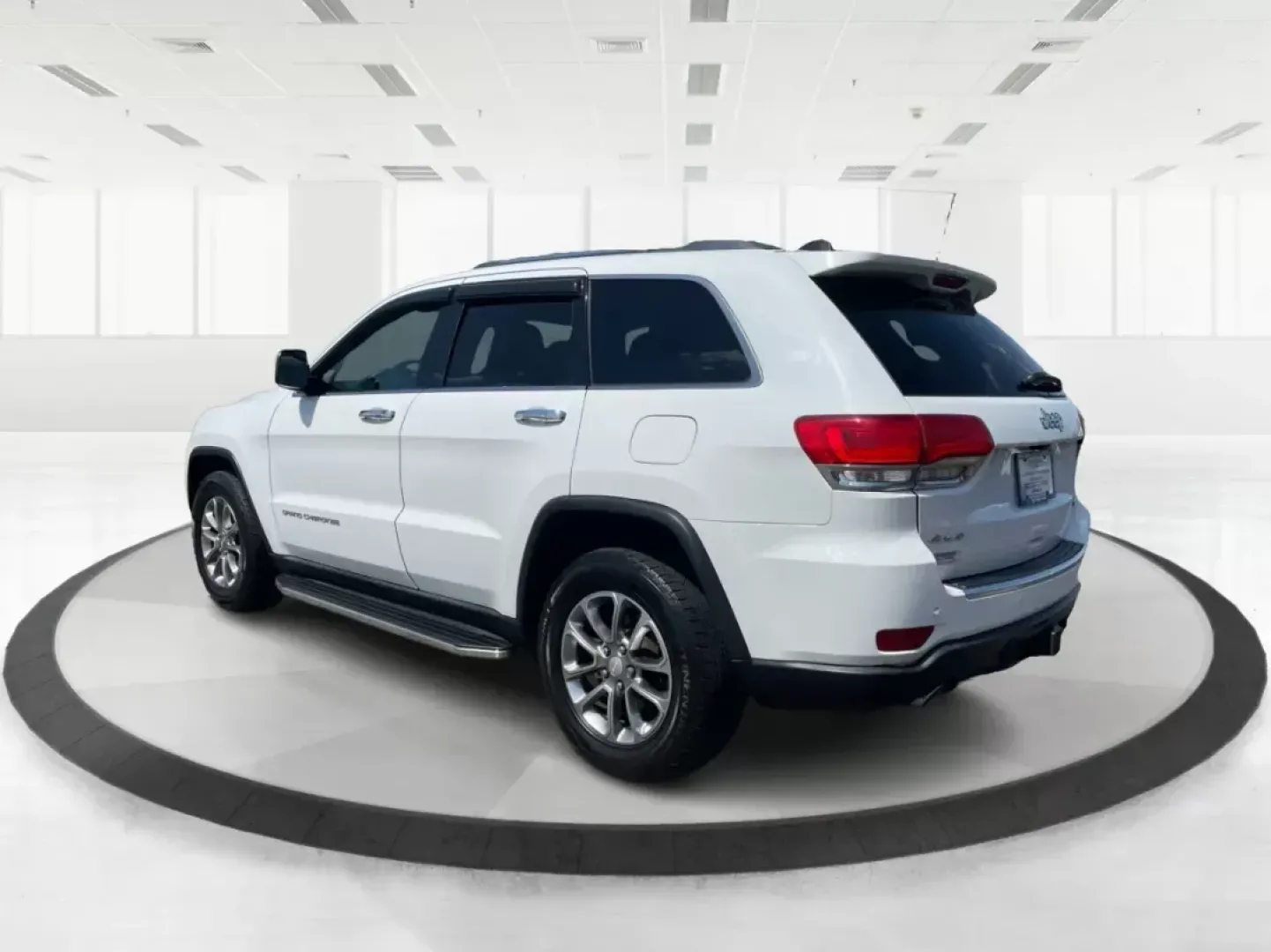 2014 Jeep Grand Cherokee Limited (1C4RJFBG6EC) with an Other engine, located at 8750 N County Rd 25A, Piqua, OH, 45356, (937) 908-9800, 40.164391, -84.232513 - Photo#4
