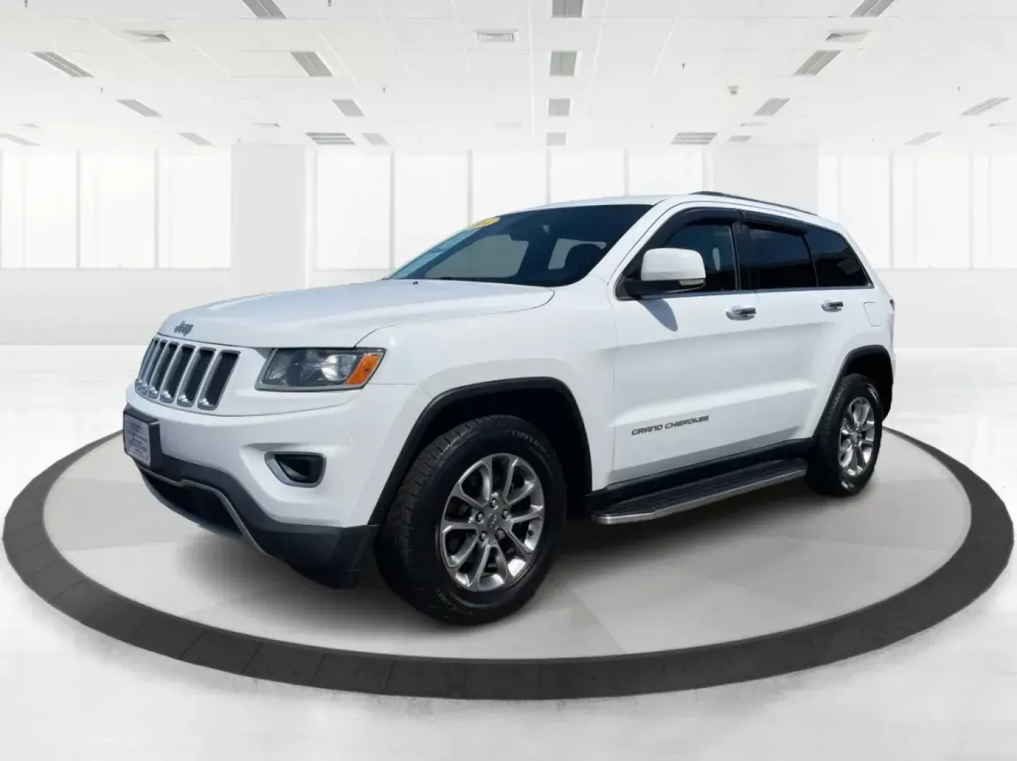 2014 Jeep Grand Cherokee Limited (1C4RJFBG6EC) with an Other engine, located at 8750 N County Rd 25A, Piqua, OH, 45356, (937) 908-9800, 40.164391, -84.232513 - Photo#7
