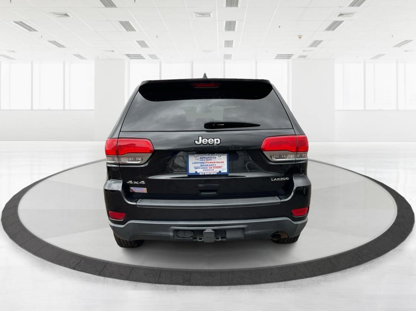 2014 Brilliant Black Crystal P Jeep Grand Cherokee Laredo 4WD (1C4RJFAG5EC) with an 3.6L V6 DOHC 24V engine, 5-Speed Automatic transmission, located at 401 Woodman Dr, Riverside, OH, 45431, (937) 908-9800, 39.761024, -84.120956 - Photo#2