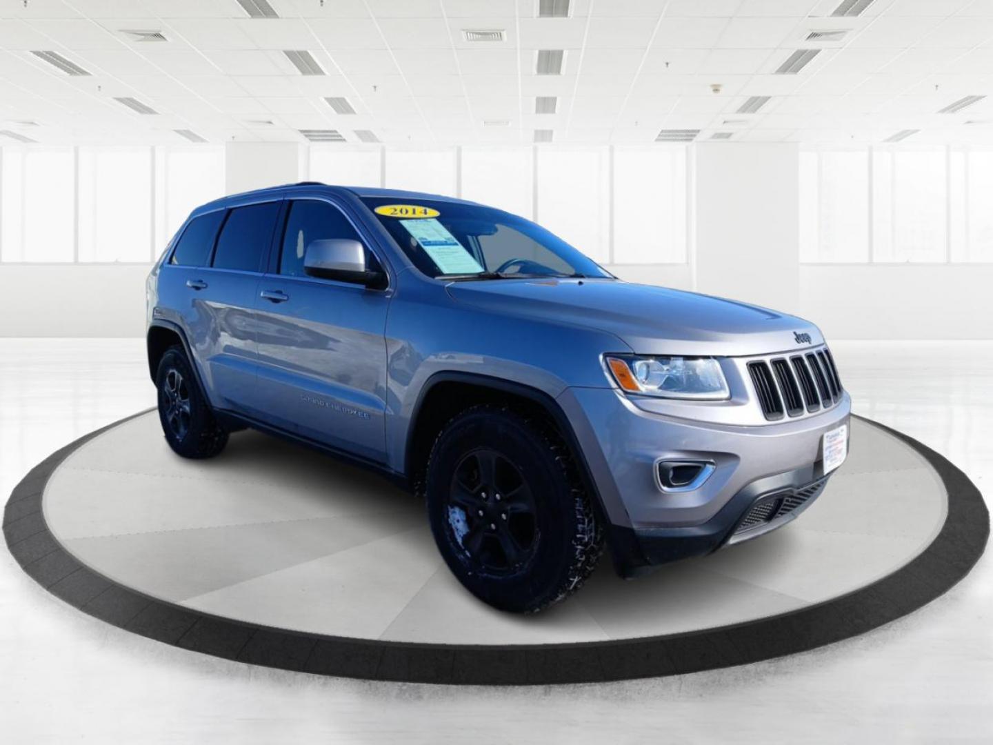 2014 Jeep Grand Cherokee Laredo 4WD (1C4RJFAG1EC) with an 3.6L V6 DOHC 24V engine, 5-Speed Automatic transmission, located at 1951 S Dayton Lakeview Rd., New Carlisle, OH, 45344, (937) 908-9800, 39.890999, -84.050255 - Photo#0
