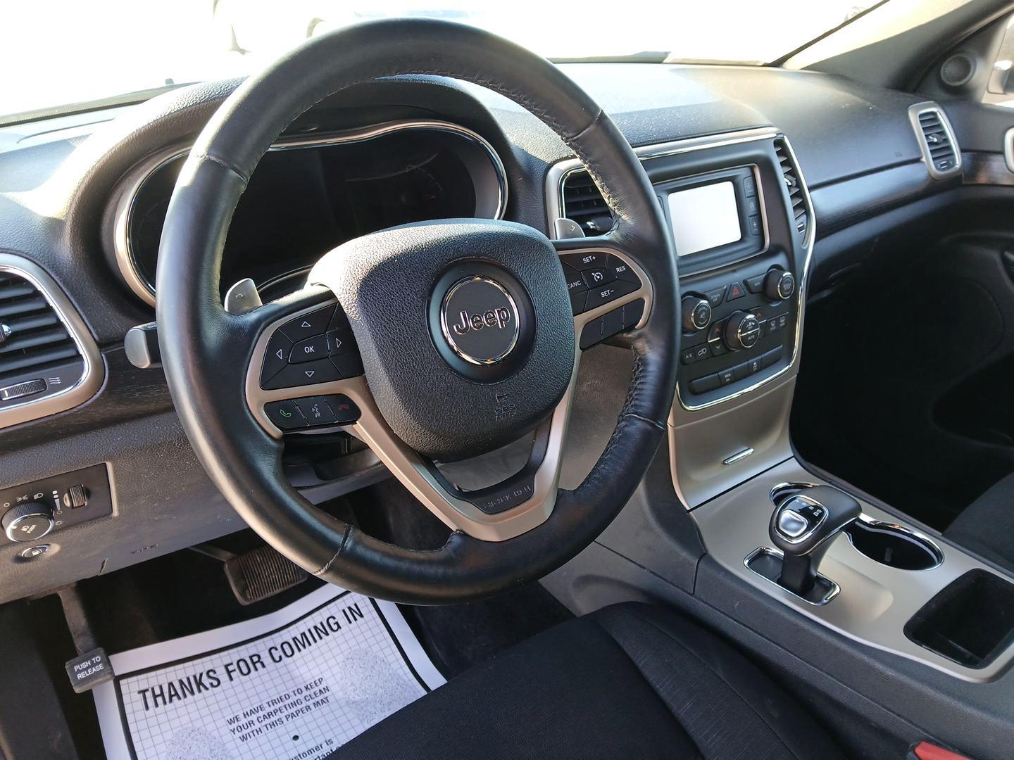 2014 Jeep Grand Cherokee Laredo 4WD (1C4RJFAG1EC) with an 3.6L V6 DOHC 24V engine, 5-Speed Automatic transmission, located at 1951 S Dayton Lakeview Rd., New Carlisle, OH, 45344, (937) 908-9800, 39.890999, -84.050255 - Photo#7