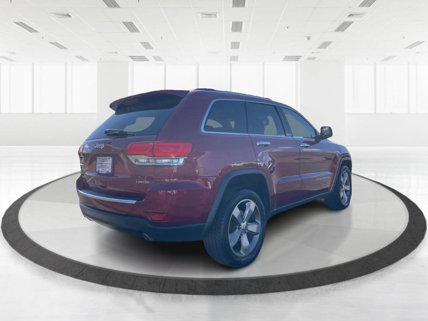 2014 Jeep Grand Cherokee Limited (1C4RJFBG5EC) with an 3.6L V-6 DOHC engine, located at 1951 S Dayton Lakeview Rd., New Carlisle, OH, 45344, (937) 908-9800, 39.890999, -84.050255 - Photo#2