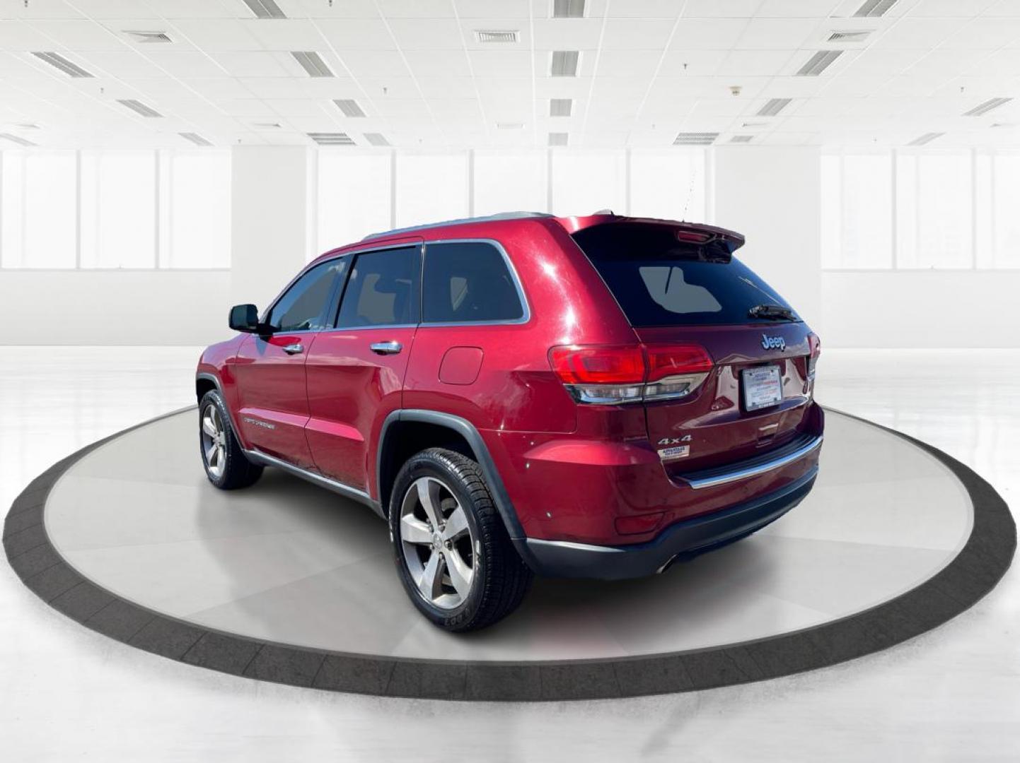 2014 Jeep Grand Cherokee Limited (1C4RJFBG5EC) with an 3.6L V-6 DOHC engine, located at 1951 S Dayton Lakeview Rd., New Carlisle, OH, 45344, (937) 908-9800, 39.890999, -84.050255 - Photo#4