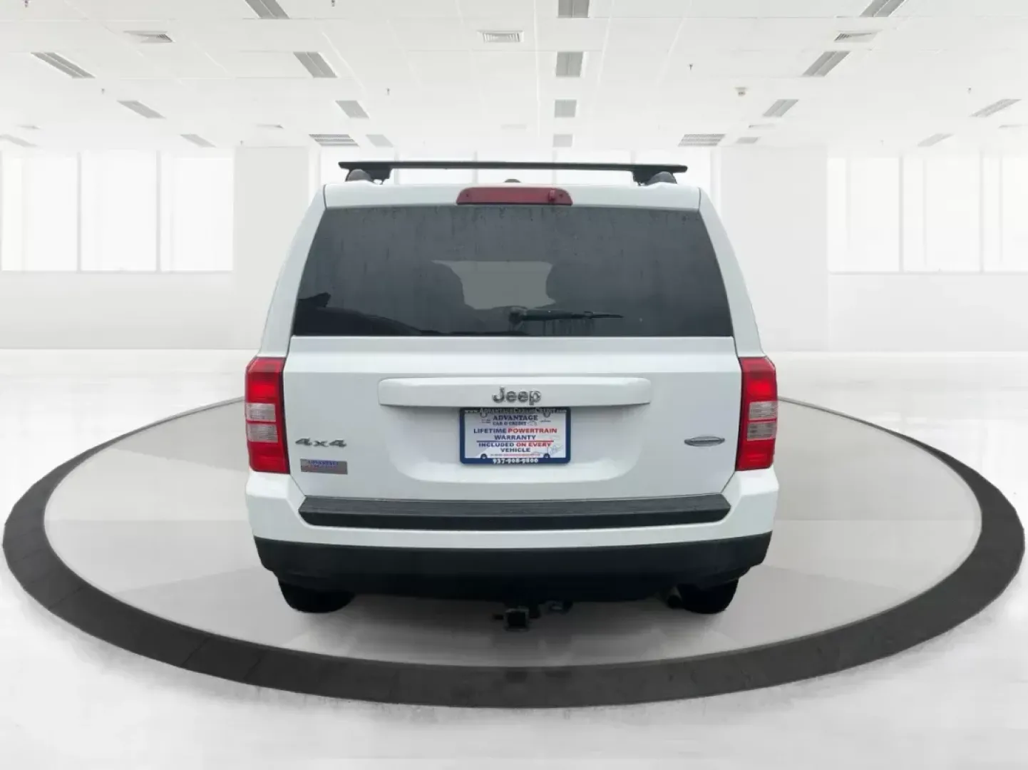 2014 Jeep Patriot Latitude (1C4NJRFB4ED) with an 2.4L I-4 DOHC engine, located at 880 E. National Road, OH, 45377, (937) 908-9800, 39.891918, -84.183975 - Photo#2