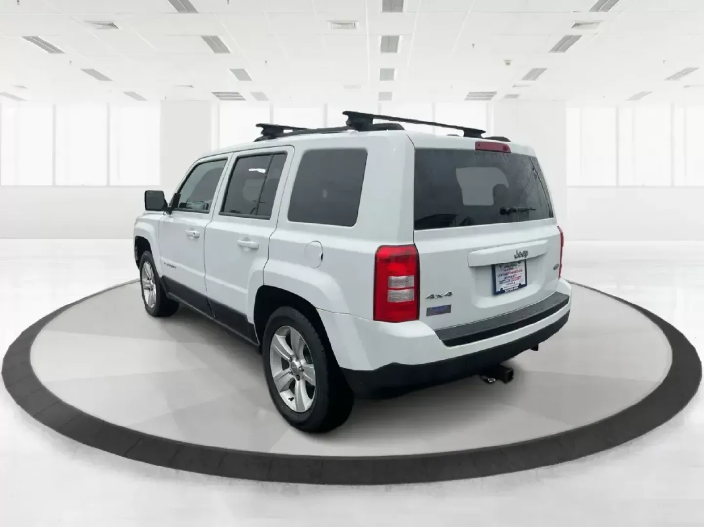 2014 Jeep Patriot Latitude (1C4NJRFB4ED) with an 2.4L I-4 DOHC engine, located at 880 E. National Road, OH, 45377, (937) 908-9800, 39.891918, -84.183975 - Photo#4