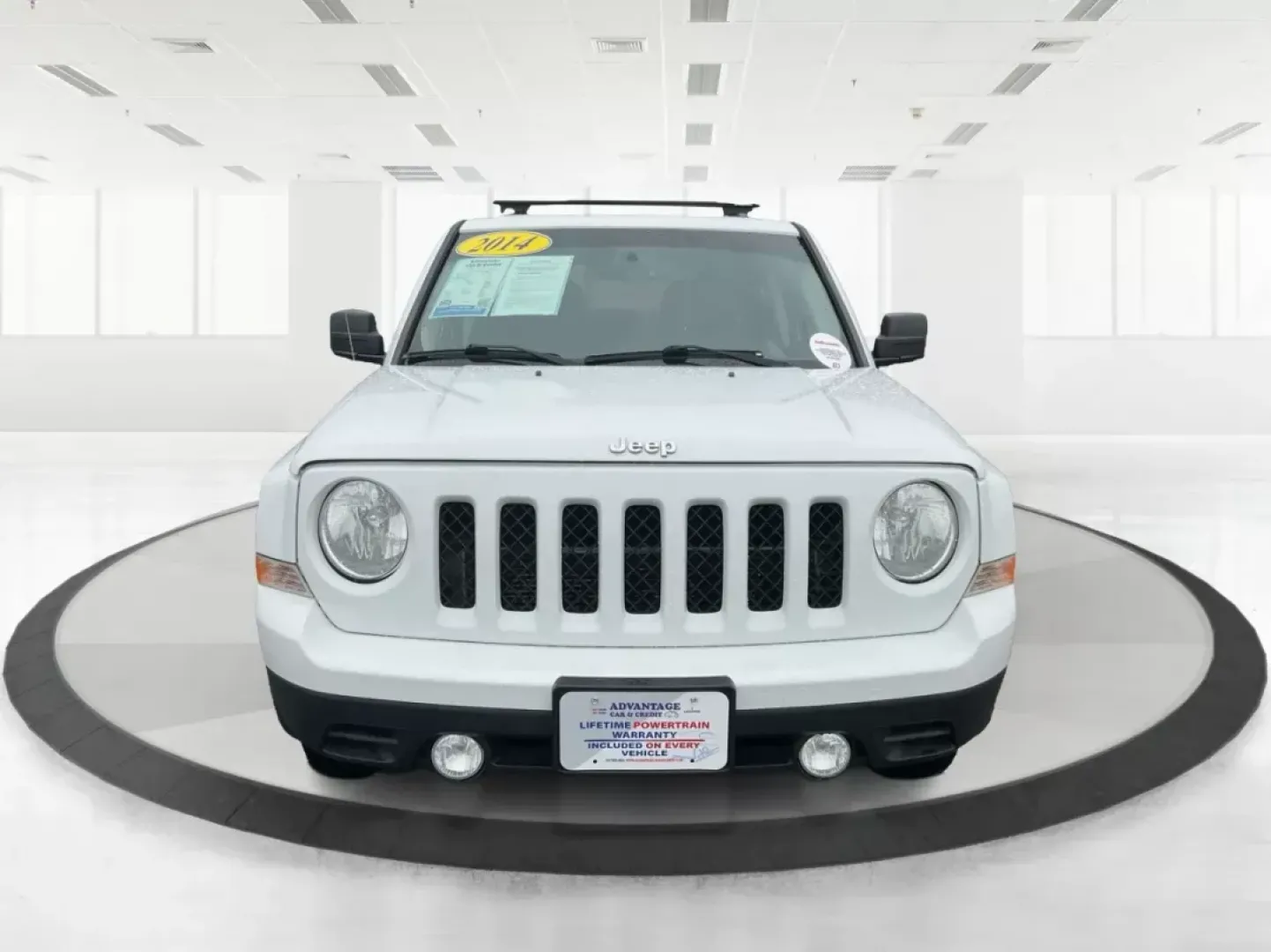 2014 Jeep Patriot Latitude (1C4NJRFB4ED) with an 2.4L I-4 DOHC engine, located at 880 E. National Road, OH, 45377, (937) 908-9800, 39.891918, -84.183975 - Photo#6