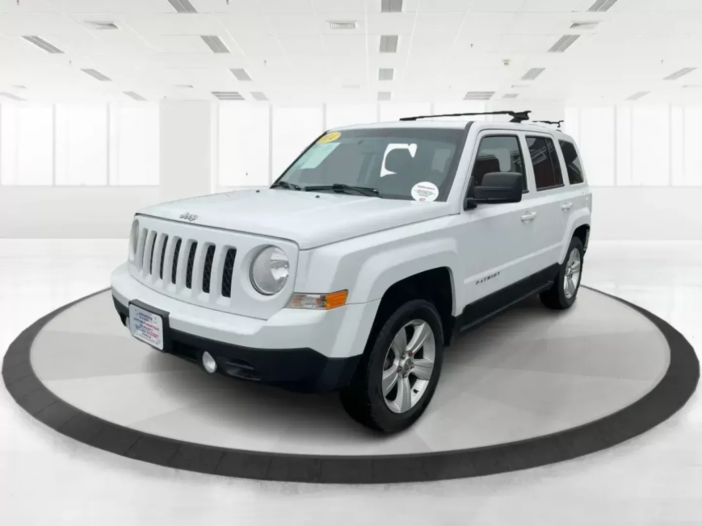 2014 Jeep Patriot Latitude (1C4NJRFB4ED) with an 2.4L I-4 DOHC engine, located at 880 E. National Road, OH, 45377, (937) 908-9800, 39.891918, -84.183975 - Photo#7