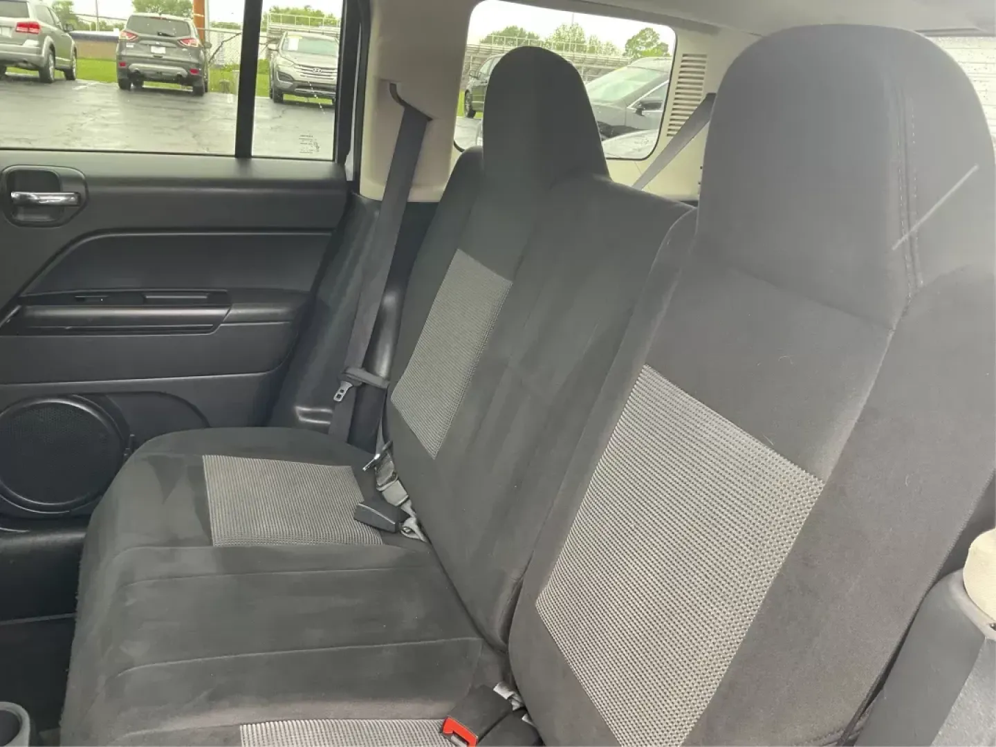 2014 Jeep Patriot Latitude (1C4NJRFB4ED) with an 2.4L I-4 DOHC engine, located at 880 E. National Road, OH, 45377, (937) 908-9800, 39.891918, -84.183975 - Photo#9