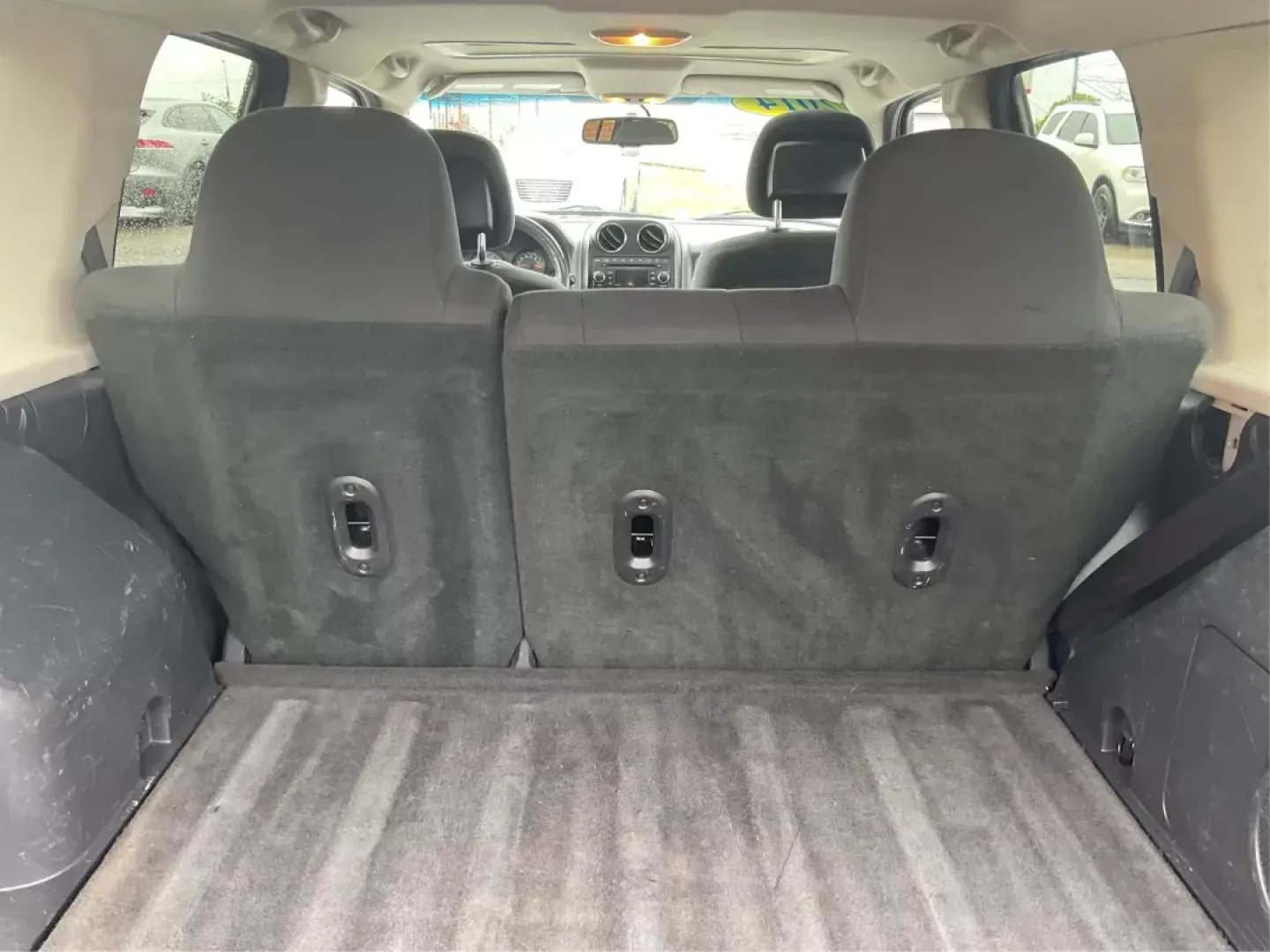 2014 Jeep Patriot Latitude (1C4NJRFB4ED) with an 2.4L I-4 DOHC engine, located at 880 E. National Road, OH, 45377, (937) 908-9800, 39.891918, -84.183975 - Photo#11