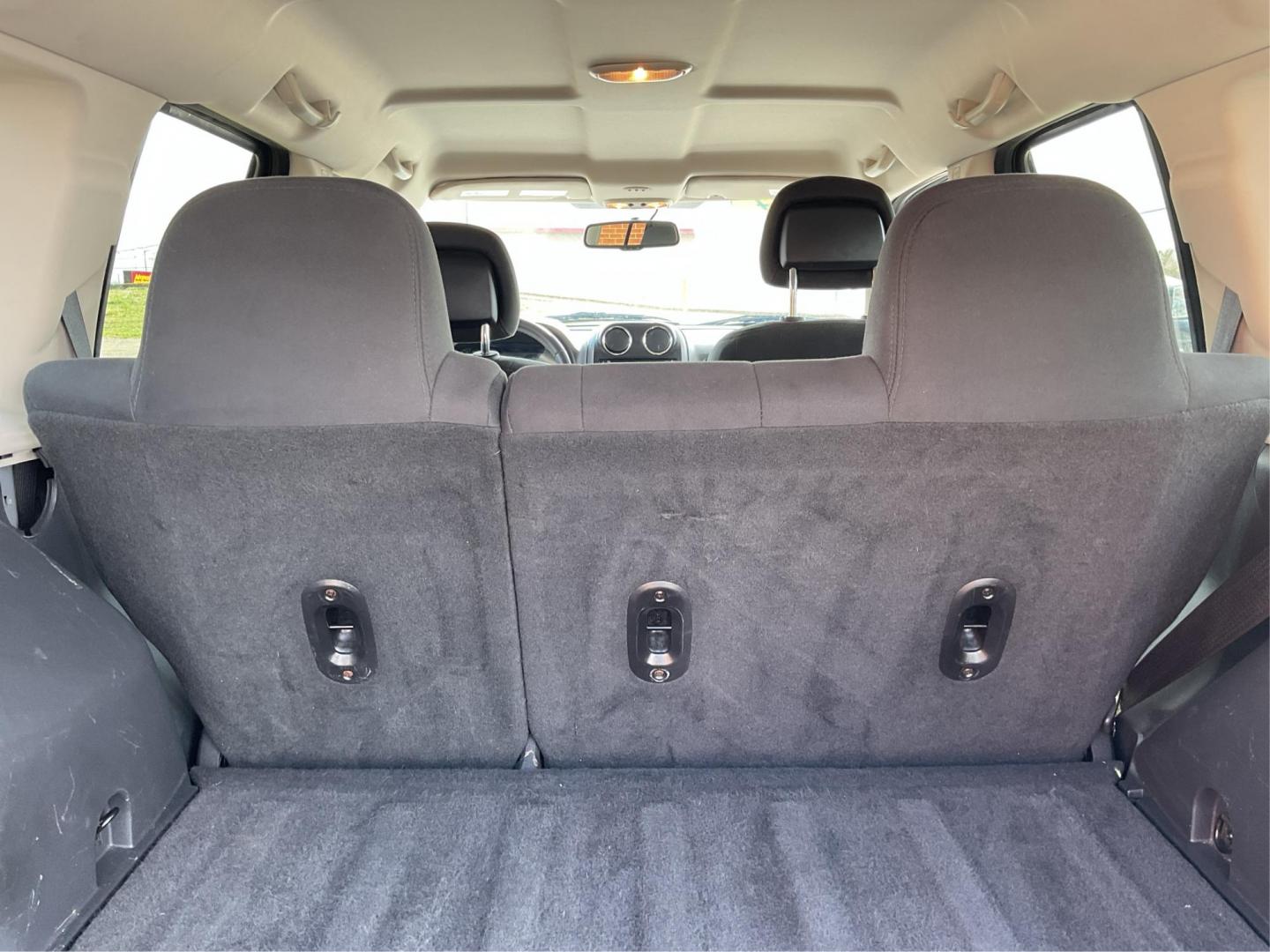 2014 Bright Silver Metallic CC Jeep Patriot Latitude 2WD (1C4NJPFA5ED) with an 2.0L L4 DOHC 16V engine, located at 1951 S Dayton Lakeview Rd., New Carlisle, OH, 45344, (937) 908-9800, 39.890999, -84.050255 - Photo#9