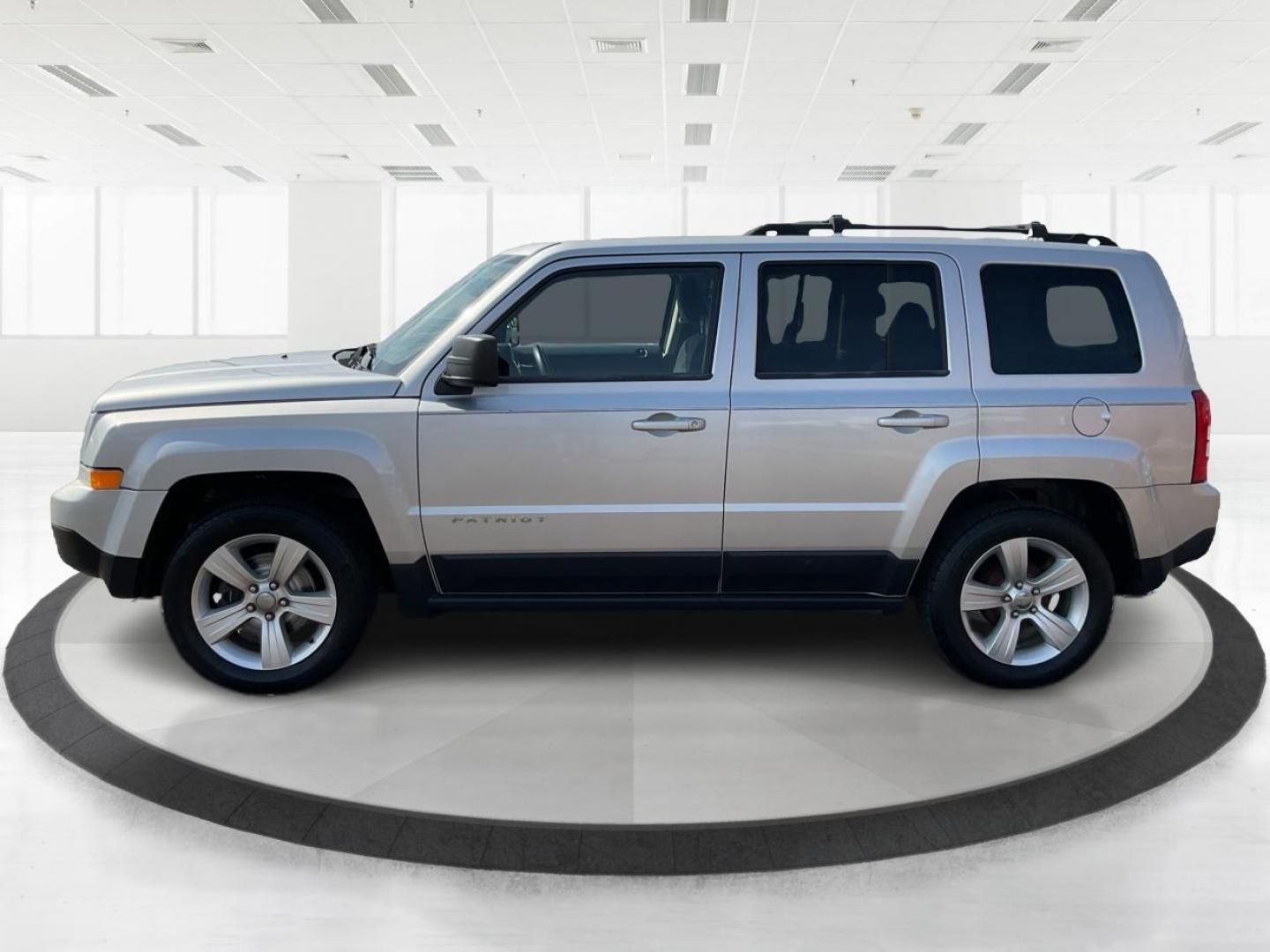 2014 Bright Silver Metallic CC Jeep Patriot Latitude 2WD (1C4NJPFA5ED) with an 2.0L L4 DOHC 16V engine, located at 1951 S Dayton Lakeview Rd., New Carlisle, OH, 45344, (937) 908-9800, 39.890999, -84.050255 - Photo#3
