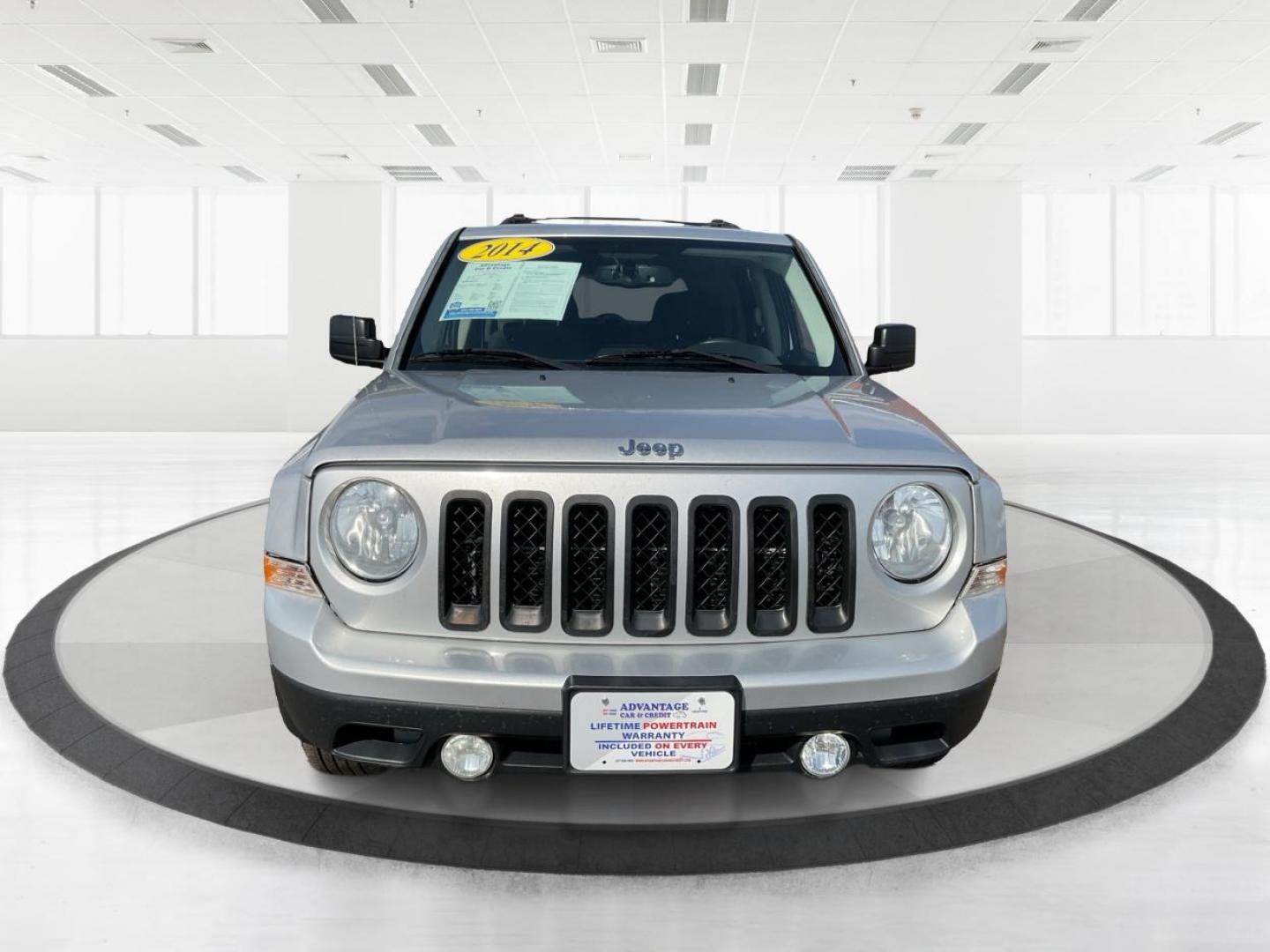 2014 Bright Silver Metallic CC Jeep Patriot Latitude 2WD (1C4NJPFA5ED) with an 2.0L L4 DOHC 16V engine, located at 1951 S Dayton Lakeview Rd., New Carlisle, OH, 45344, (937) 908-9800, 39.890999, -84.050255 - Photo#4