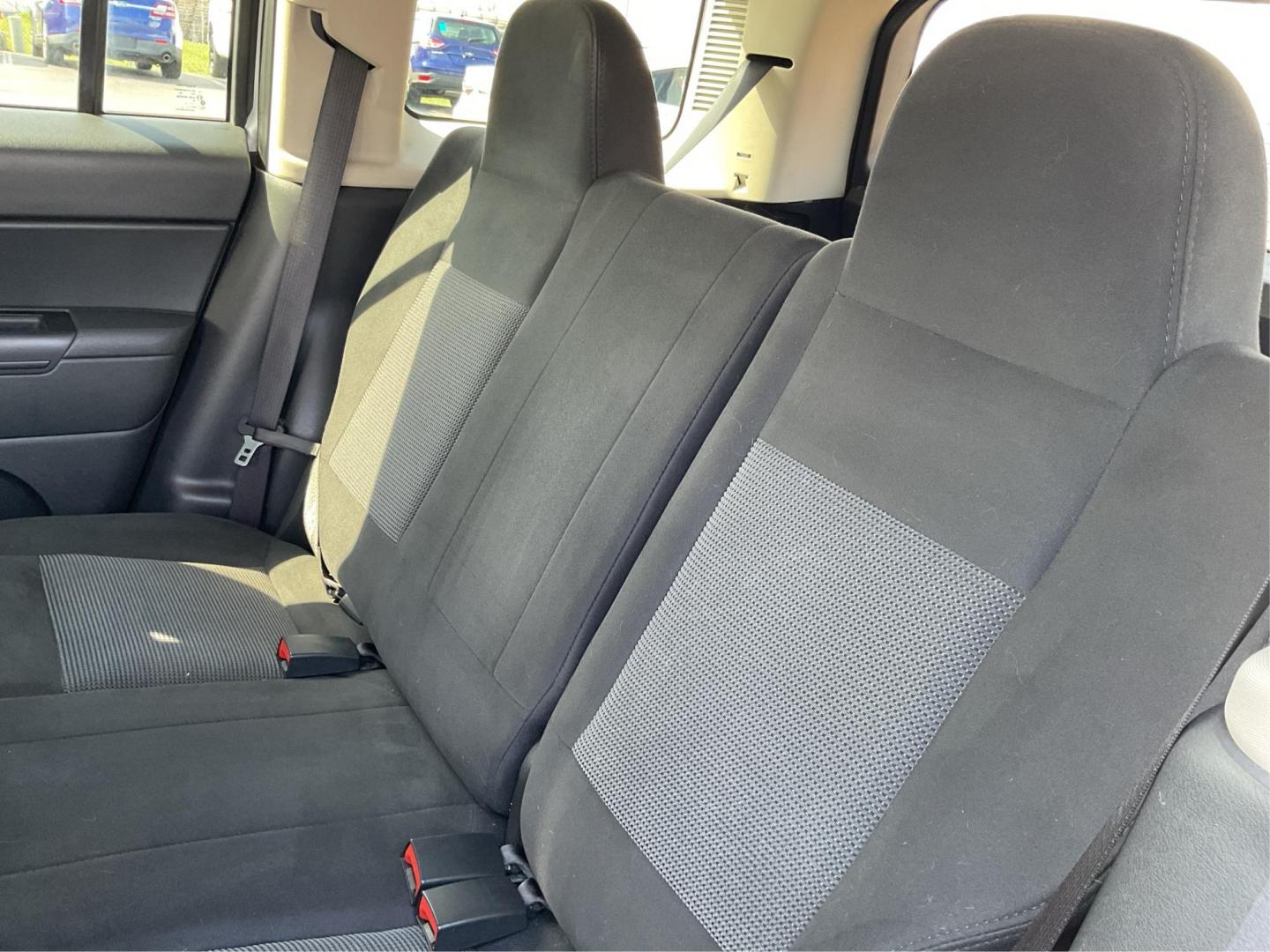 2014 Bright Silver Metallic CC Jeep Patriot Latitude 2WD (1C4NJPFA5ED) with an 2.0L L4 DOHC 16V engine, located at 1951 S Dayton Lakeview Rd., New Carlisle, OH, 45344, (937) 908-9800, 39.890999, -84.050255 - Photo#7