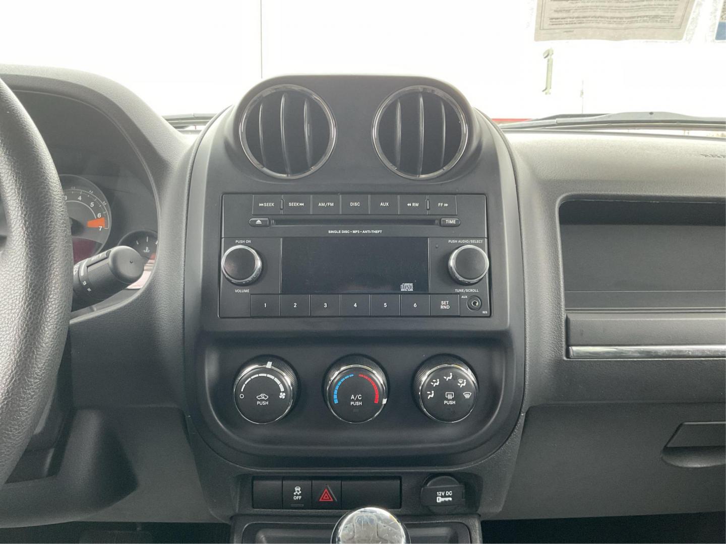 2014 Jeep Patriot Sport (1C4NJRBB0ED) with an Other engine, located at 1099 N County Rd 25A , Troy, OH, 45373, (937) 908-9800, 40.057041, -84.215462 - Photo#12