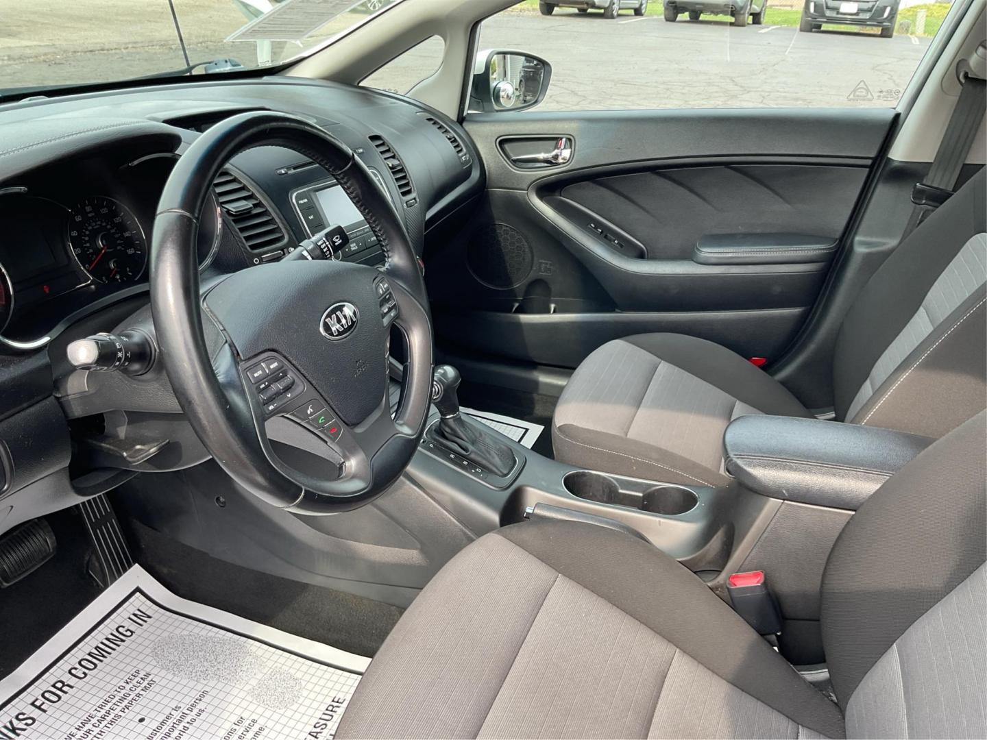 2014 Kia Forte EX (KNAFX4A81E5) with an 2L I-4 gasoline direct injection engine, located at 1099 N County Rd 25A , Troy, OH, 45373, (937) 908-9800, 40.057041, -84.215462 - Photo#9