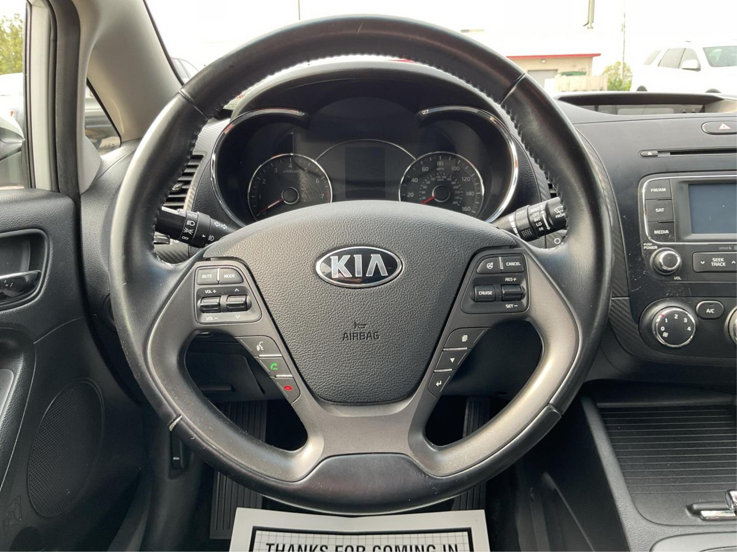 2014 Kia Forte EX (KNAFX4A81E5) with an 2L I-4 gasoline direct injection engine, located at 1099 N County Rd 25A , Troy, OH, 45373, (937) 908-9800, 40.057041, -84.215462 - Photo#16