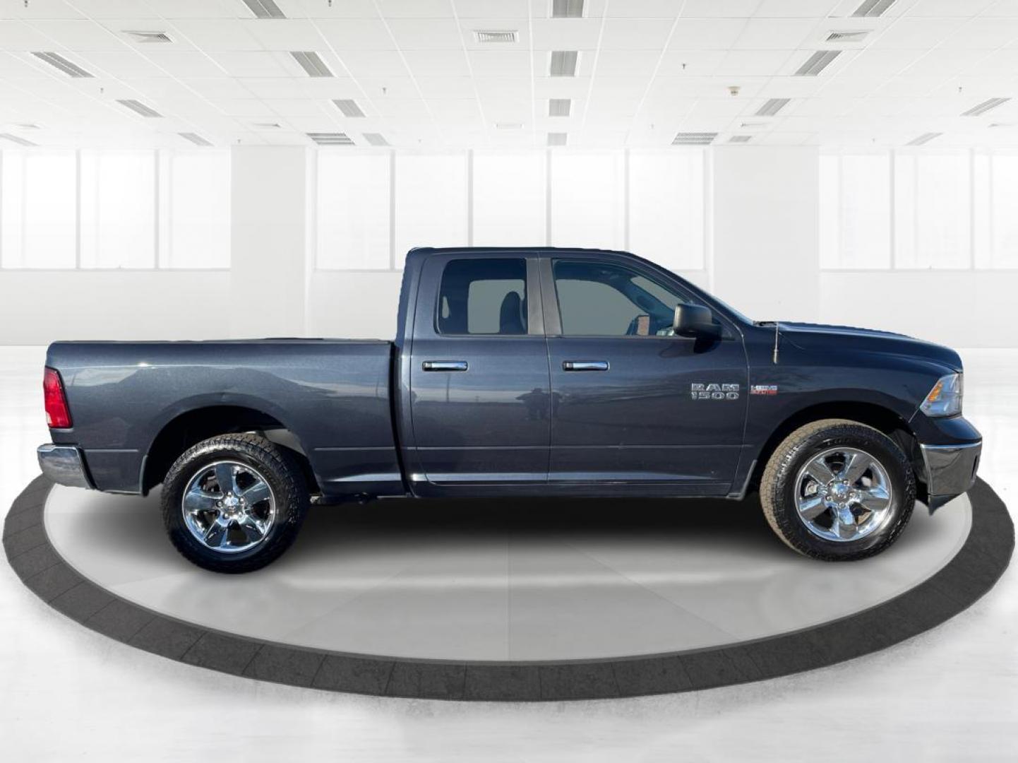 2014 Ram 1500 SLT Quad Cab 4WD (1C6RR7GT7ES) with an 5.7L V8 OHV 16V engine, 8-Speed Automatic transmission, located at 880 E. National Road, OH, 45377, (937) 908-9800, 39.891918, -84.183975 - Photo#1