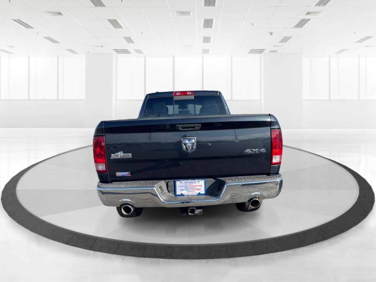 2014 Ram 1500 SLT Quad Cab 4WD (1C6RR7GT7ES) with an 5.7L V8 OHV 16V engine, 8-Speed Automatic transmission, located at 880 E. National Road, OH, 45377, (937) 908-9800, 39.891918, -84.183975 - Photo#3