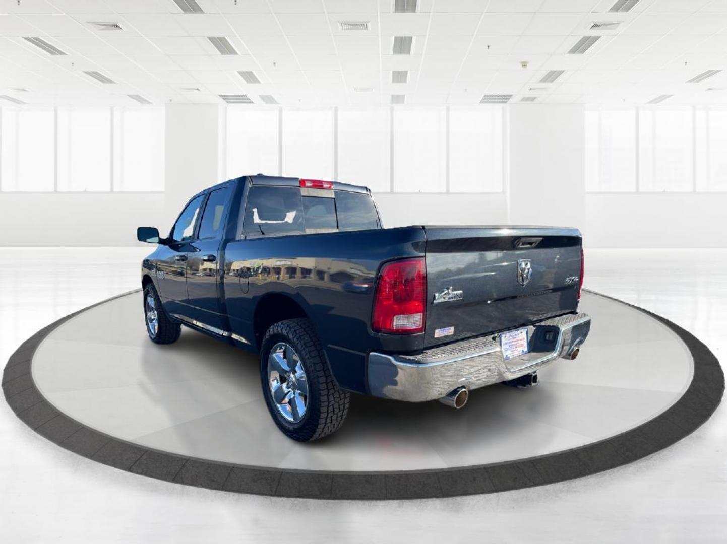 2014 Ram 1500 SLT Quad Cab 4WD (1C6RR7GT7ES) with an 5.7L V8 OHV 16V engine, 8-Speed Automatic transmission, located at 880 E. National Road, OH, 45377, (937) 908-9800, 39.891918, -84.183975 - Photo#4