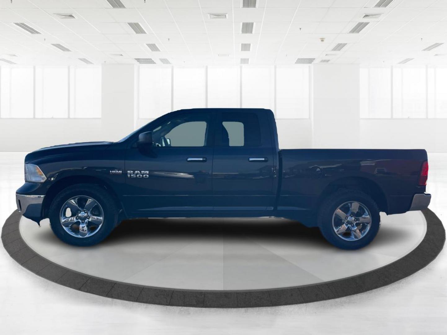 2014 Ram 1500 SLT Quad Cab 4WD (1C6RR7GT7ES) with an 5.7L V8 OHV 16V engine, 8-Speed Automatic transmission, located at 880 E. National Road, OH, 45377, (937) 908-9800, 39.891918, -84.183975 - Photo#5