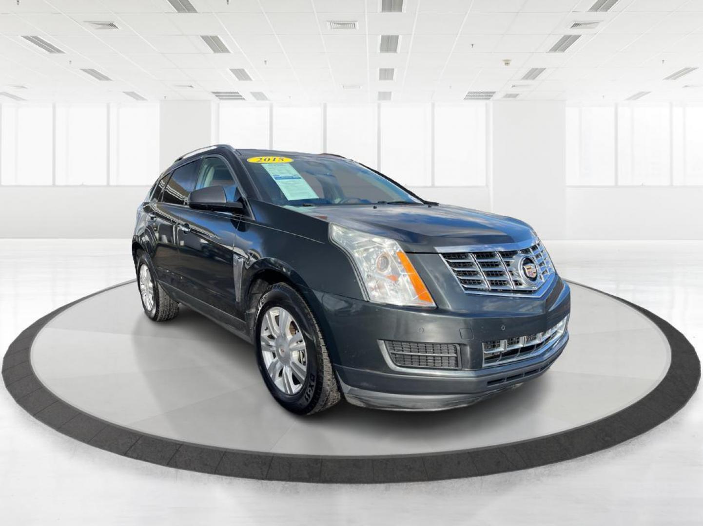 2015 Graphite Metallic Cadillac SRX Luxury Collection FWD (3GYFNBE3XFS) with an 3.6L V6 DOHC 24V FFV engine, 6-Speed Automatic transmission, located at 1951 S Dayton Lakeview Rd., New Carlisle, OH, 45344, (937) 908-9800, 39.890999, -84.050255 - Photo#0