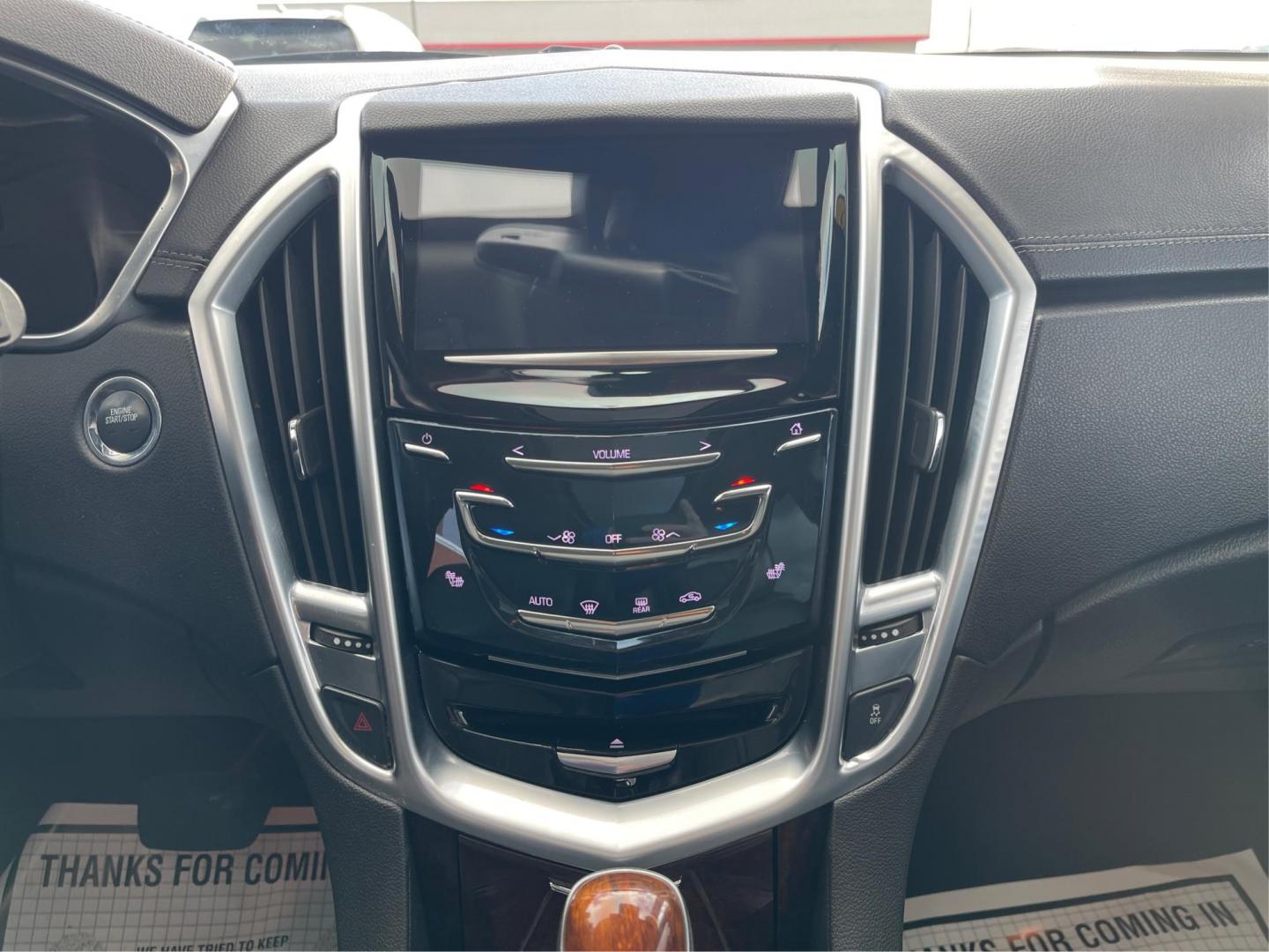 2015 Graphite Metallic Cadillac SRX Luxury Collection FWD (3GYFNBE3XFS) with an 3.6L V6 DOHC 24V FFV engine, 6-Speed Automatic transmission, located at 1951 S Dayton Lakeview Rd., New Carlisle, OH, 45344, (937) 908-9800, 39.890999, -84.050255 - Photo#12