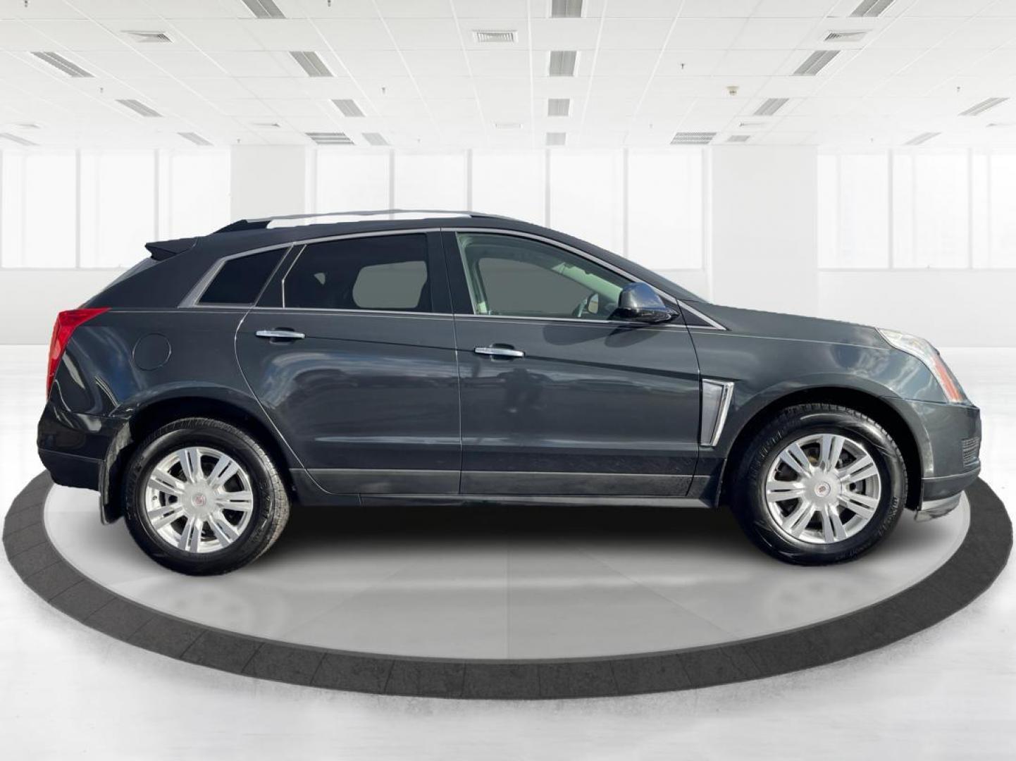 2015 Graphite Metallic Cadillac SRX Luxury Collection FWD (3GYFNBE3XFS) with an 3.6L V6 DOHC 24V FFV engine, 6-Speed Automatic transmission, located at 1951 S Dayton Lakeview Rd., New Carlisle, OH, 45344, (937) 908-9800, 39.890999, -84.050255 - Photo#1