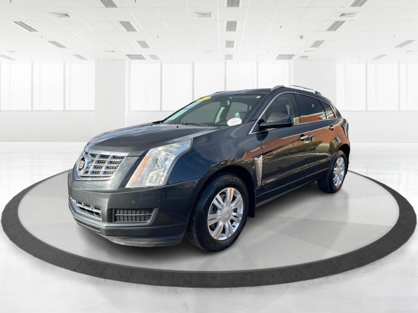 2015 Graphite Metallic Cadillac SRX Luxury Collection FWD (3GYFNBE3XFS) with an 3.6L V6 DOHC 24V FFV engine, 6-Speed Automatic transmission, located at 1951 S Dayton Lakeview Rd., New Carlisle, OH, 45344, (937) 908-9800, 39.890999, -84.050255 - Photo#7