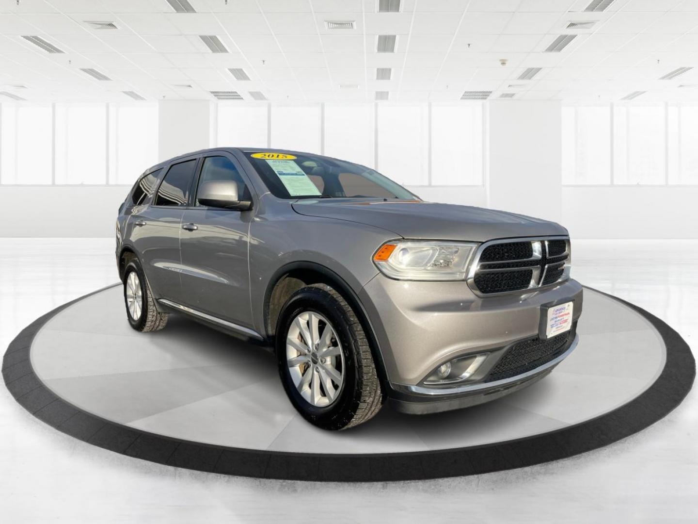 2015 Dodge Durango SXT AWD (1C4RDJAG2FC) with an 3.6L V6 DOHC 24V engine, 8-Speed Automatic transmission, located at 1951 S Dayton Lakeview Rd., New Carlisle, OH, 45344, (937) 908-9800, 39.890999, -84.050255 - Photo#0