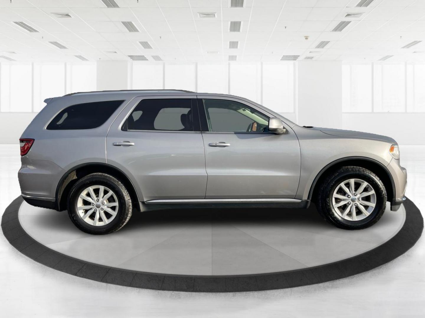 2015 Dodge Durango SXT AWD (1C4RDJAG2FC) with an 3.6L V6 DOHC 24V engine, 8-Speed Automatic transmission, located at 1951 S Dayton Lakeview Rd., New Carlisle, OH, 45344, (937) 908-9800, 39.890999, -84.050255 - Photo#1
