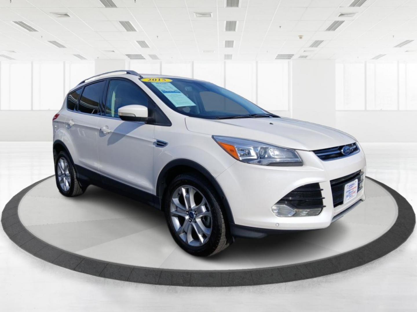 2015 Ford Escape Titanium 4WD (1FMCU9J93FU) with an 2.0L L4 DOHC 16V engine, 6-Speed Automatic transmission, located at 4508 South Dixie Dr, Moraine, OH, 45439, (937) 908-9800, 39.807072, -84.031563 - Photo#0