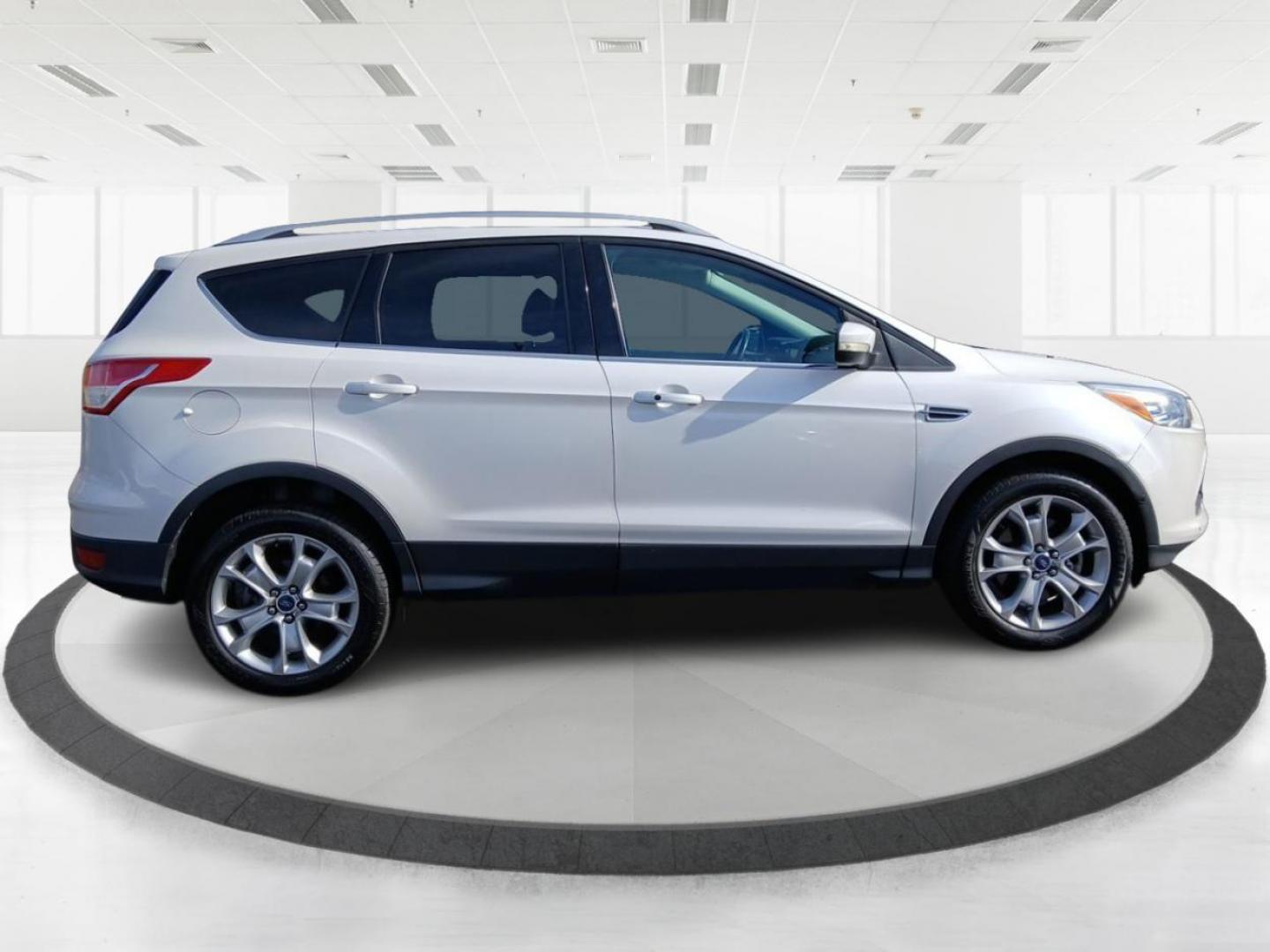 2015 Ford Escape Titanium 4WD (1FMCU9J93FU) with an 2.0L L4 DOHC 16V engine, 6-Speed Automatic transmission, located at 4508 South Dixie Dr, Moraine, OH, 45439, (937) 908-9800, 39.807072, -84.031563 - Photo#1