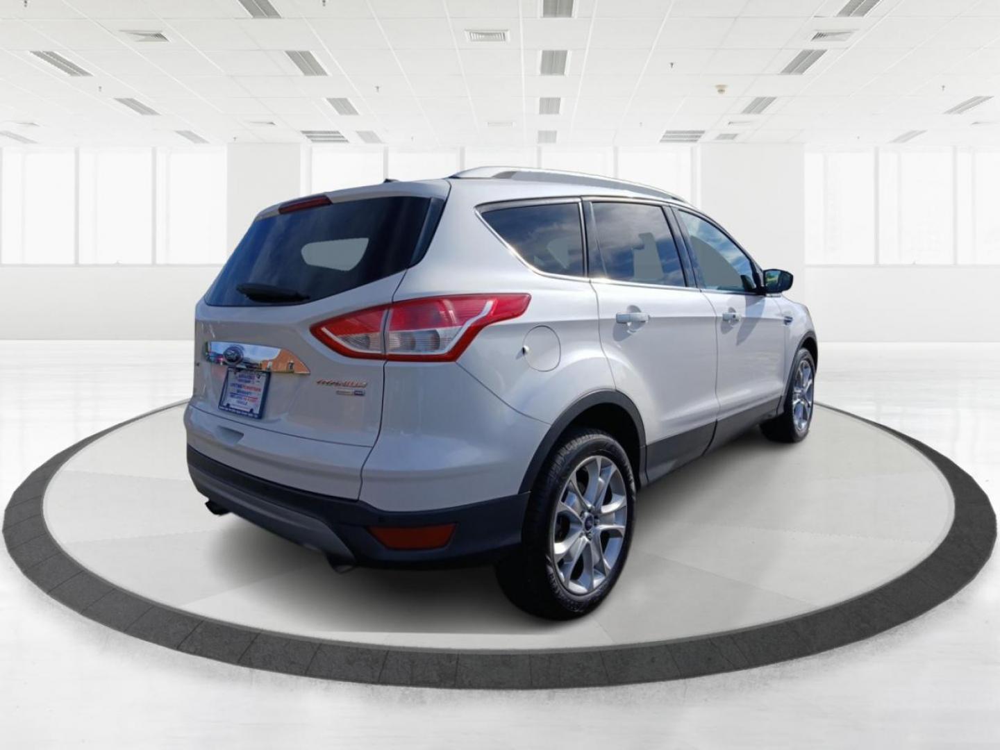 2015 Ford Escape Titanium 4WD (1FMCU9J93FU) with an 2.0L L4 DOHC 16V engine, 6-Speed Automatic transmission, located at 4508 South Dixie Dr, Moraine, OH, 45439, (937) 908-9800, 39.807072, -84.031563 - Photo#2