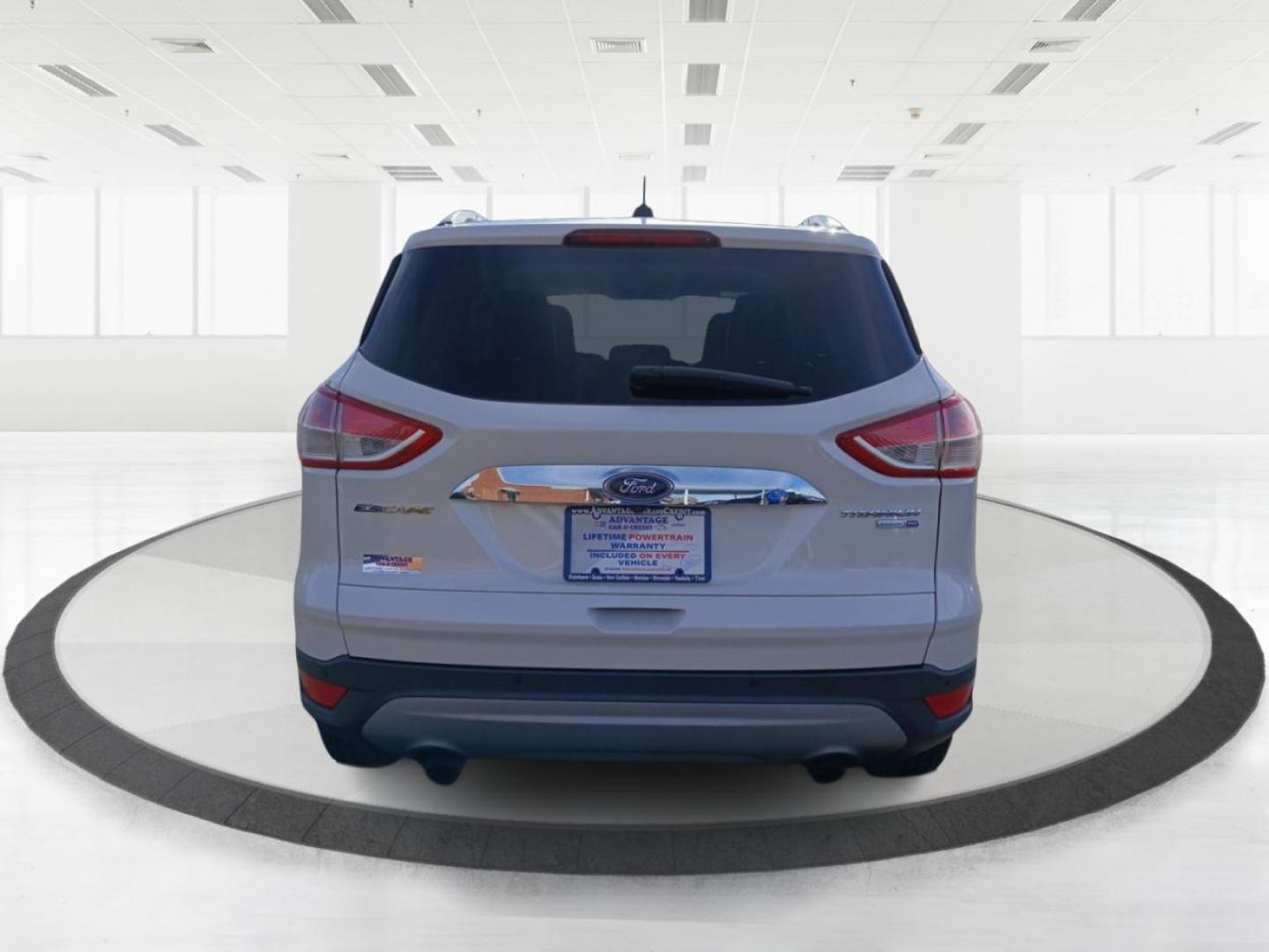 2015 Ford Escape Titanium 4WD (1FMCU9J93FU) with an 2.0L L4 DOHC 16V engine, 6-Speed Automatic transmission, located at 4508 South Dixie Dr, Moraine, OH, 45439, (937) 908-9800, 39.807072, -84.031563 - Photo#3