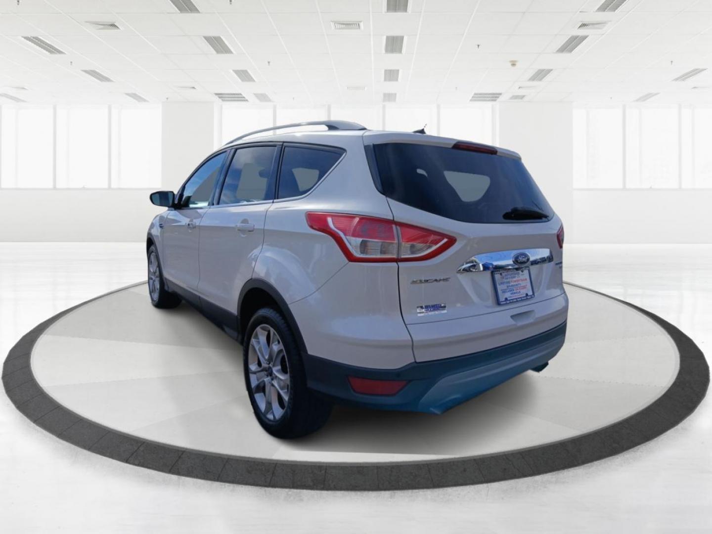 2015 Ford Escape Titanium 4WD (1FMCU9J93FU) with an 2.0L L4 DOHC 16V engine, 6-Speed Automatic transmission, located at 4508 South Dixie Dr, Moraine, OH, 45439, (937) 908-9800, 39.807072, -84.031563 - Photo#4