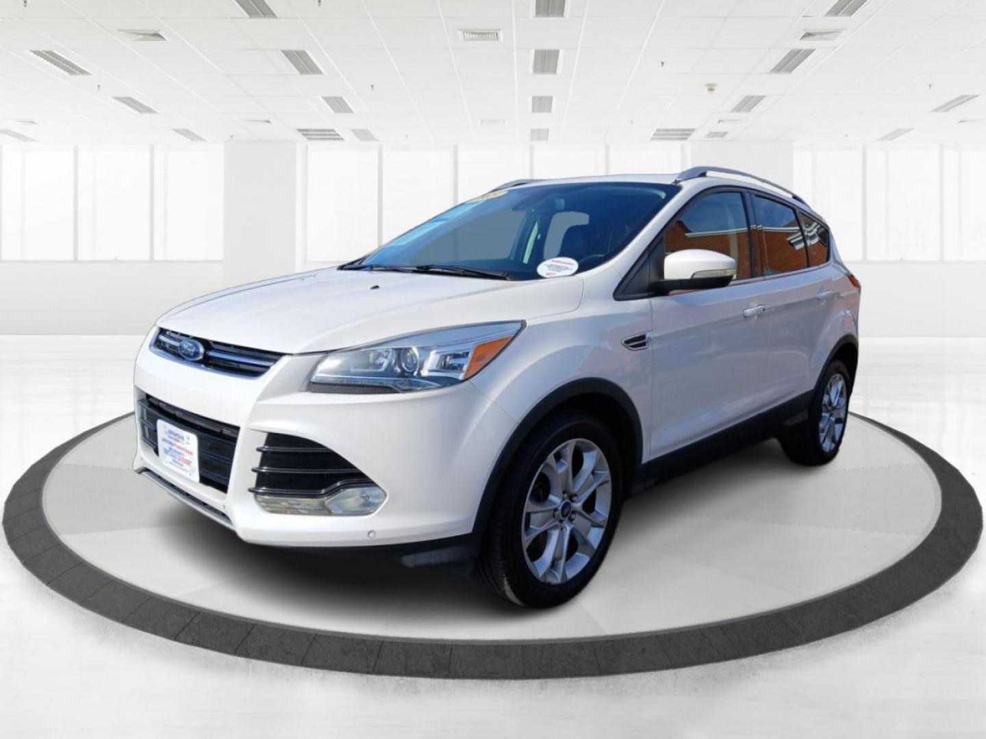 2015 Ford Escape Titanium 4WD (1FMCU9J93FU) with an 2.0L L4 DOHC 16V engine, 6-Speed Automatic transmission, located at 4508 South Dixie Dr, Moraine, OH, 45439, (937) 908-9800, 39.807072, -84.031563 - Photo#7