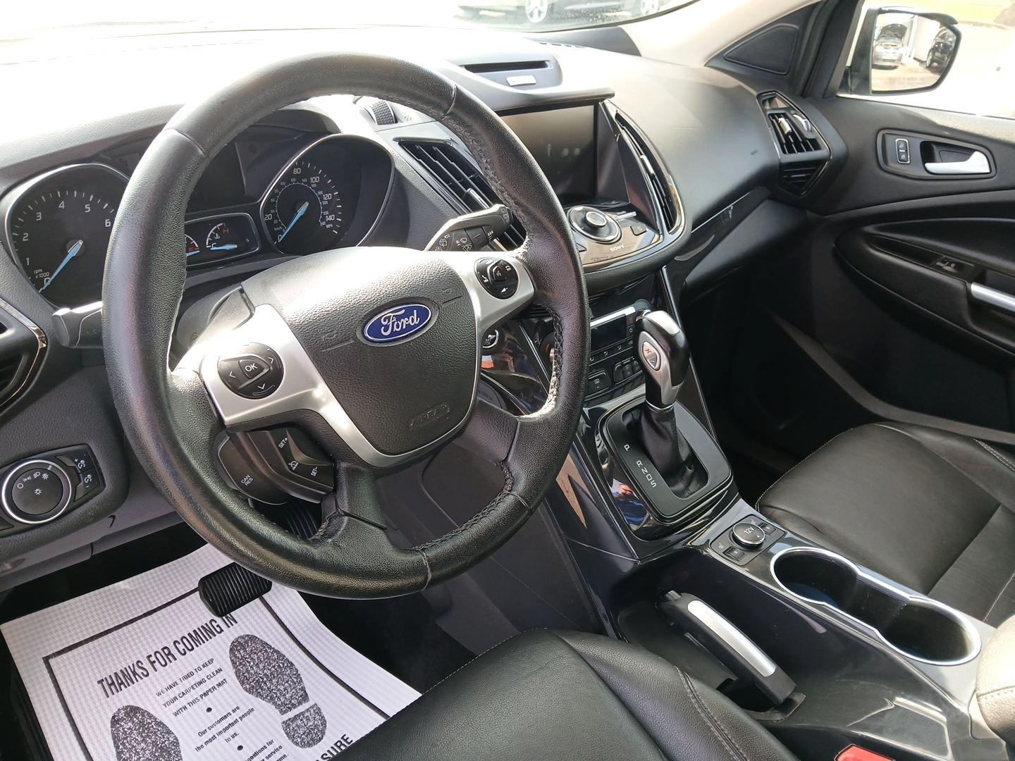 2015 Ford Escape Titanium 4WD (1FMCU9J93FU) with an 2.0L L4 DOHC 16V engine, 6-Speed Automatic transmission, located at 4508 South Dixie Dr, Moraine, OH, 45439, (937) 908-9800, 39.807072, -84.031563 - Photo#8