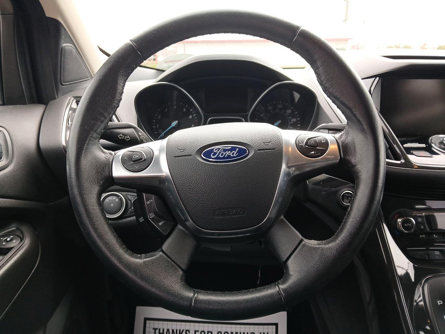 2015 Ford Escape Titanium 4WD (1FMCU9J92FU) with an 2.0L L4 DOHC 16V engine, 6-Speed Automatic transmission, located at 1230 East Main St, Xenia, OH, 45385, (937) 908-9800, 39.688042, -83.910538 - Photo#15