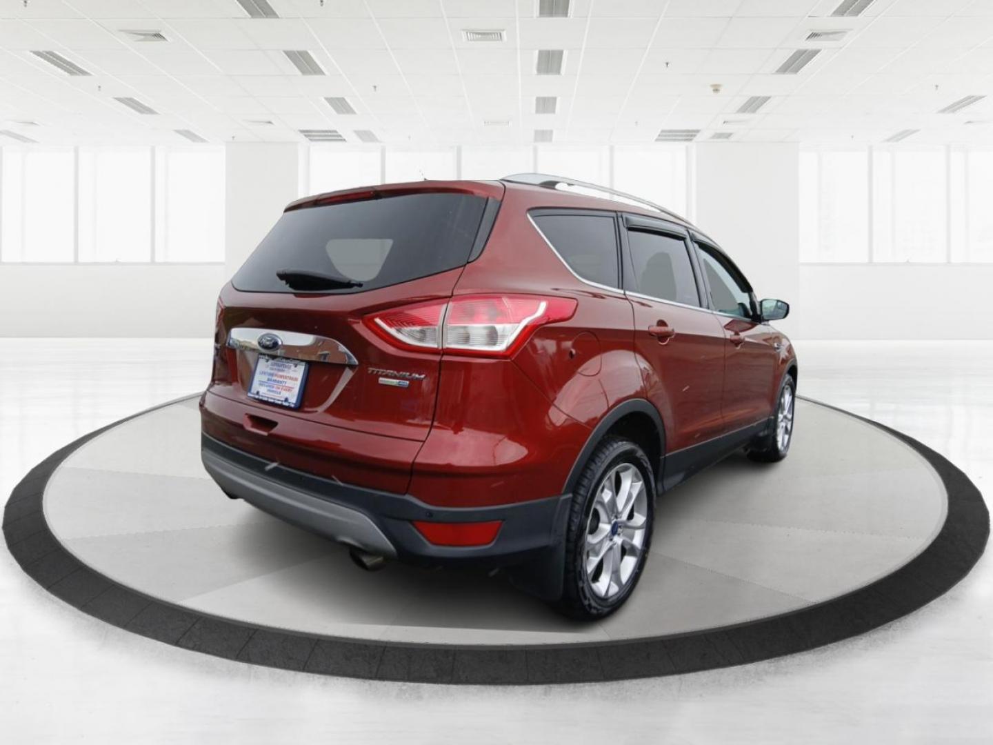 2015 Ford Escape Titanium 4WD (1FMCU9J92FU) with an 2.0L L4 DOHC 16V engine, 6-Speed Automatic transmission, located at 1230 East Main St, Xenia, OH, 45385, (937) 908-9800, 39.688042, -83.910538 - Photo#2