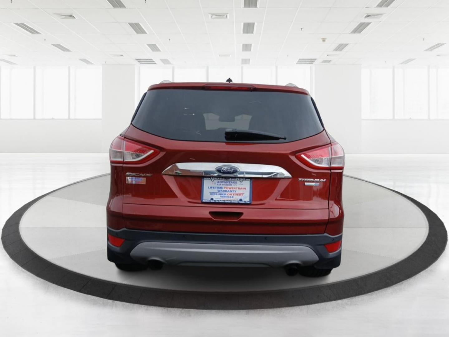 2015 Ford Escape Titanium 4WD (1FMCU9J92FU) with an 2.0L L4 DOHC 16V engine, 6-Speed Automatic transmission, located at 1230 East Main St, Xenia, OH, 45385, (937) 908-9800, 39.688042, -83.910538 - Photo#3