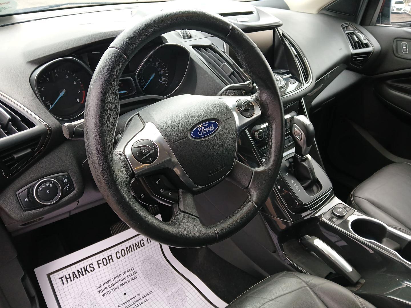 2015 Ford Escape Titanium 4WD (1FMCU9J92FU) with an 2.0L L4 DOHC 16V engine, 6-Speed Automatic transmission, located at 1230 East Main St, Xenia, OH, 45385, (937) 908-9800, 39.688042, -83.910538 - Photo#8