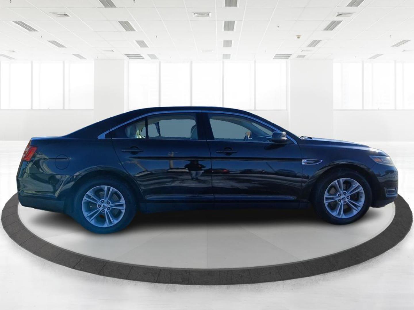2015 Ford Taurus SEL (1FAHP2E87FG) with an 3.5L V6 DOHC 24V engine, located at 1099 N County Rd 25A , Troy, OH, 45373, (937) 908-9800, 40.057041, -84.215462 - Photo#1