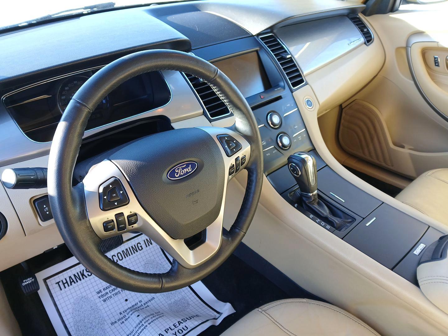 2015 Ford Taurus SEL (1FAHP2E87FG) with an 3.5L V6 DOHC 24V engine, located at 1099 N County Rd 25A , Troy, OH, 45373, (937) 908-9800, 40.057041, -84.215462 - Photo#8