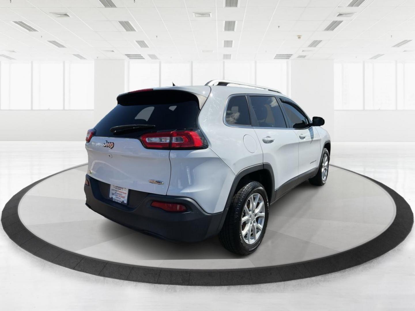 2015 Jeep Cherokee Latitude FWD (1C4PJLCB5FW) with an 2.4L L4 DOHC 16V engine, 9-Speed Automatic transmission, located at 401 Woodman Dr, Riverside, OH, 45431, (937) 908-9800, 39.761024, -84.120956 - Photo#2