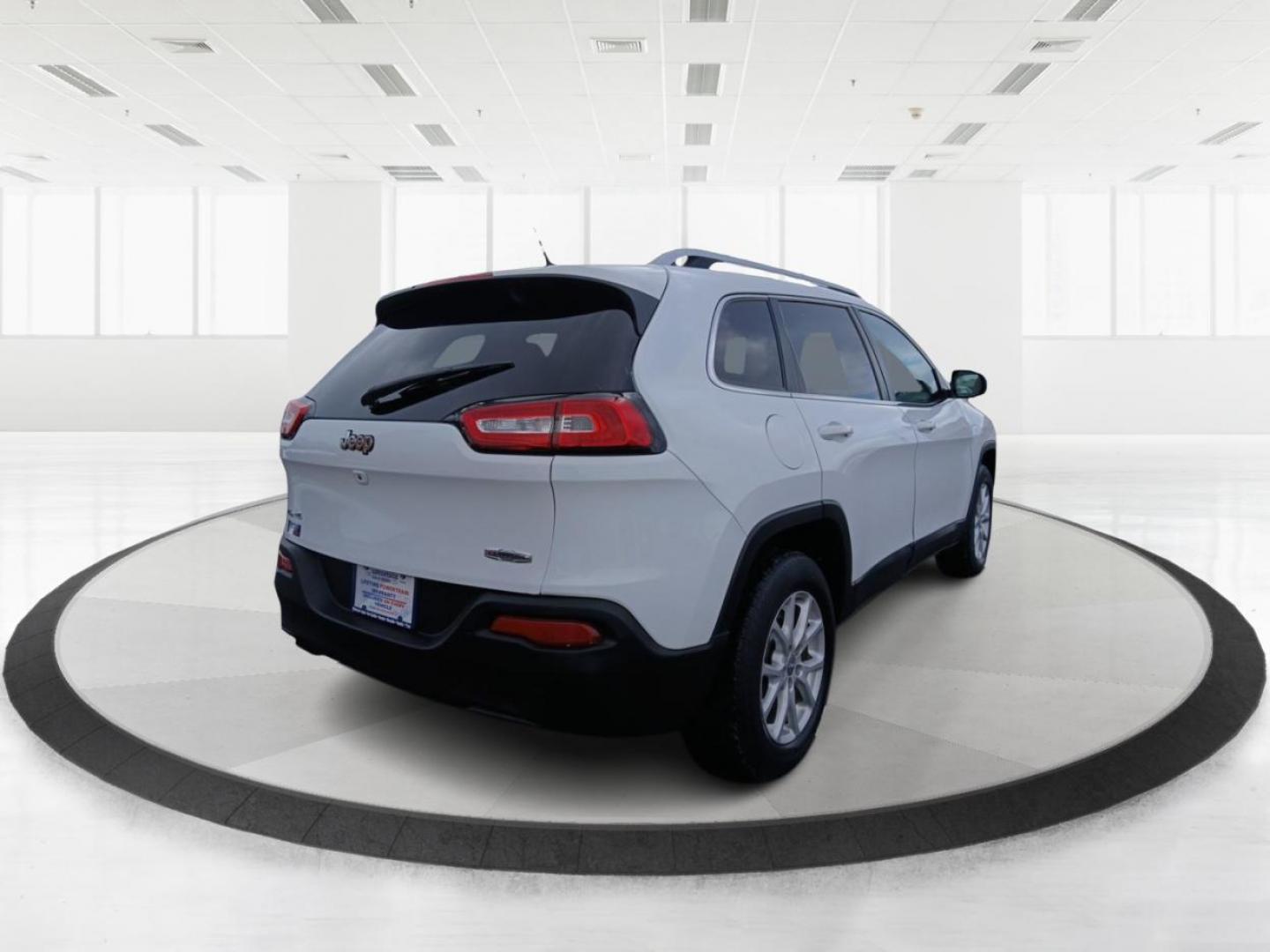 2015 Jeep Cherokee Latitude 4WD (1C4PJMCB6FW) with an 2.4L L4 DOHC 16V engine, 9-Speed Automatic transmission, located at 1099 N County Rd 25A , Troy, OH, 45373, (937) 908-9800, 40.057041, -84.215462 - Photo#2