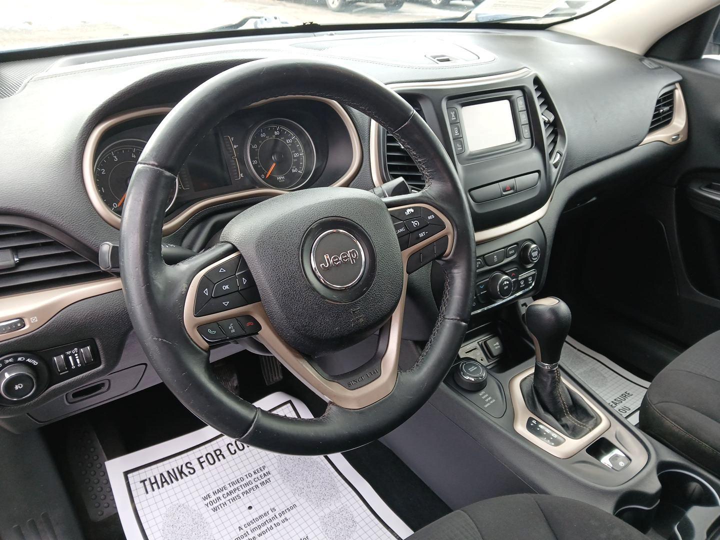 2015 Jeep Cherokee Latitude 4WD (1C4PJMCB6FW) with an 2.4L L4 DOHC 16V engine, 9-Speed Automatic transmission, located at 1099 N County Rd 25A , Troy, OH, 45373, (937) 908-9800, 40.057041, -84.215462 - Photo#8