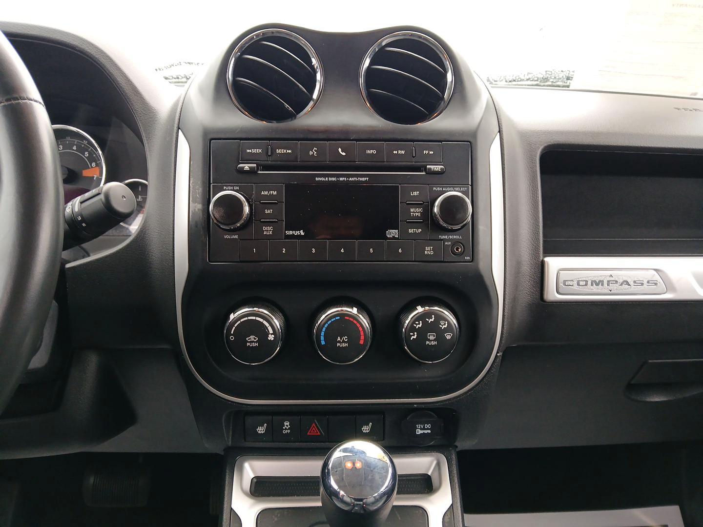 2015 Jeep Compass Latitude 4WD (1C4NJDEB2FD) with an 2.4L L4 DOHC 16V engine, 6-Speed Automatic transmission, located at 1184 Kauffman Ave, Fairborn, OH, 45324, (937) 908-9800, 39.807072, -84.031563 - Photo#12